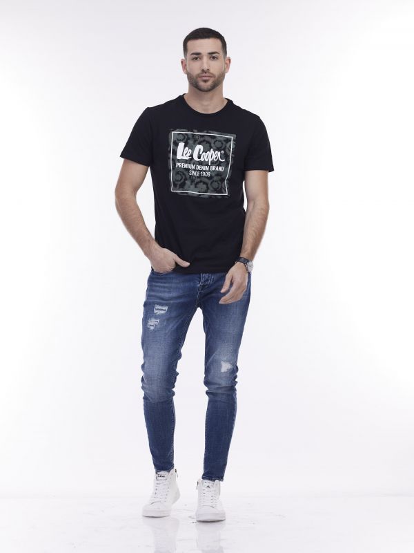 סקיני ג’ינס כחול משופשף עם קרעים