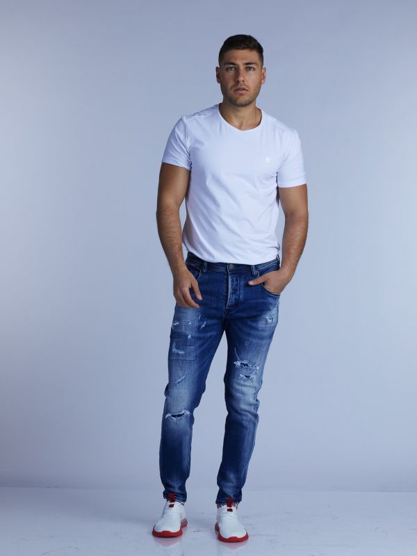 ג’ינס סקיני COLIN משופשף עם קרעים