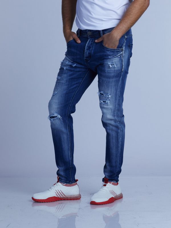 ג’ינס סקיני COLIN משופשף עם קרעים