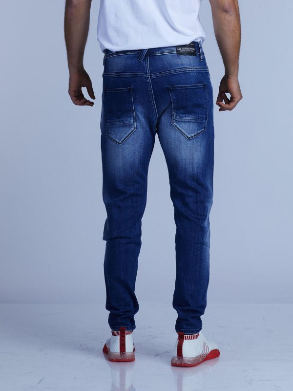 ג’ינס סקיני COLIN משופשף עם קרעים