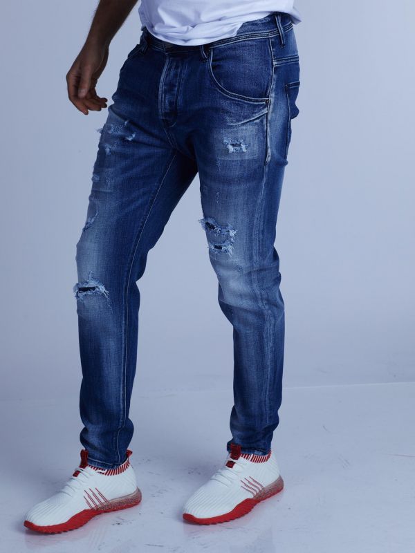 ג’ינס סקיני COLIN משופשף עם קרעים