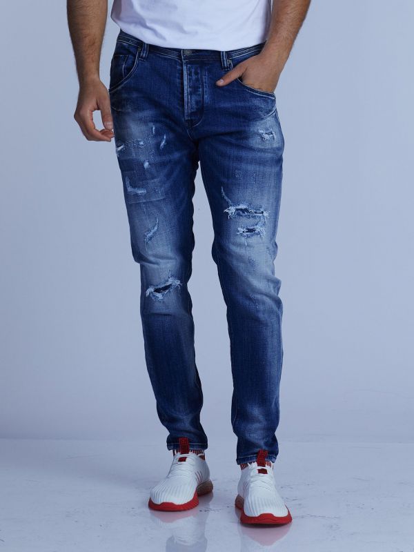 ג’ינס סקיני COLIN משופשף עם קרעים