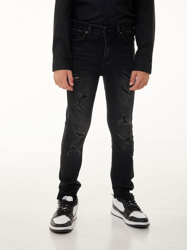 מכנסי ג’ינס בצבע שחור בגזרת סקיני עם קרעים לילדים