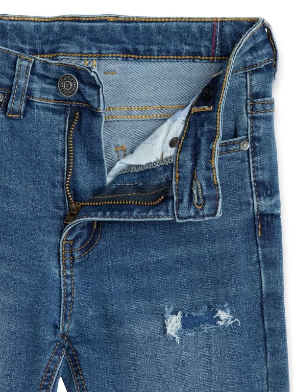 מכנסי ג’ינס ארוכים עם קרעים לילדות