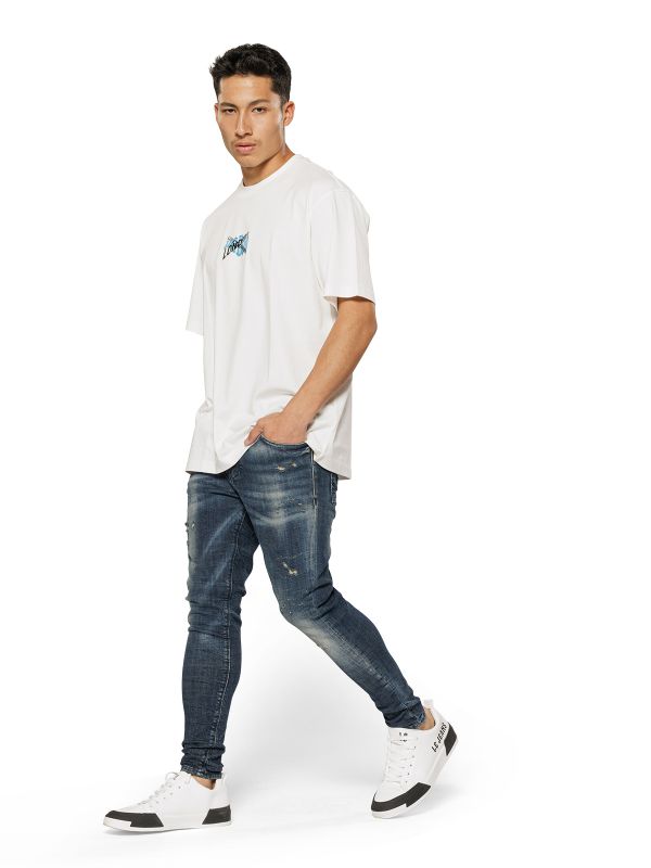 מכנסי ג’ינס COLIN כחול משופשף עם קרעים לגברים