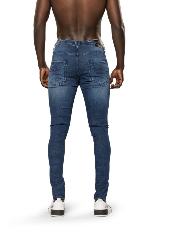 מכנסי ג’ינס סקיני בצבע כחול משופשף עם קרעים לגברים