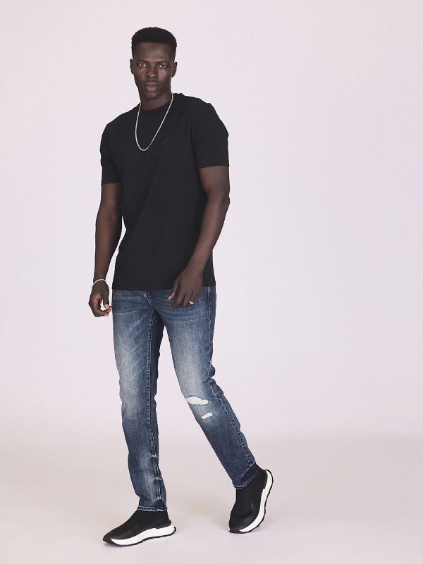 ג’ינס משופשף קרוע לגברים