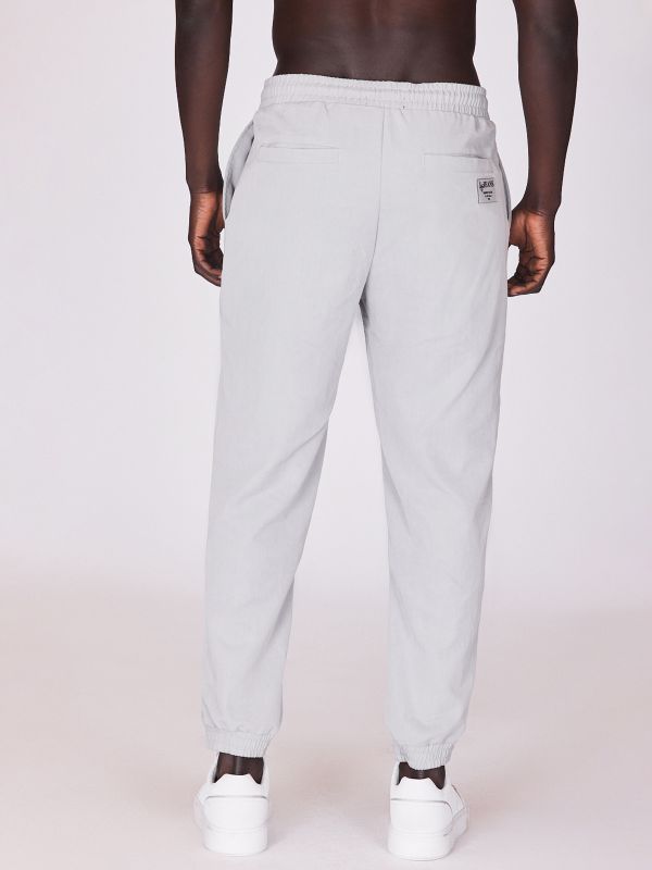 מכנסיים משוחררים עם גומי בקרסול לגברים