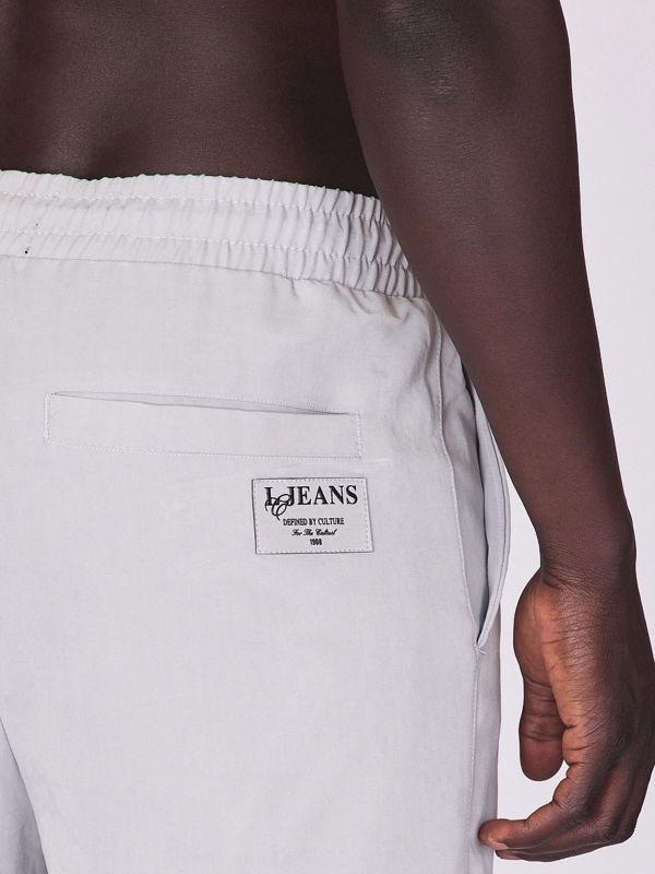 מכנסיים משוחררים עם גומי בקרסול לגברים