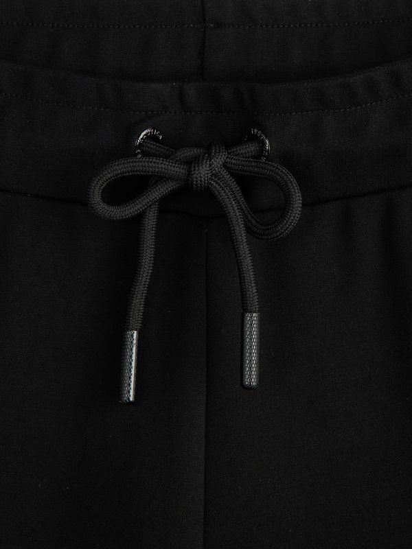 מכנס טרנינג עם פסי צד לבנים