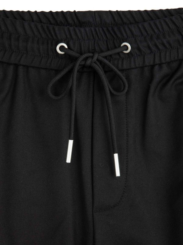 מכנסי טרנינג עם רוכסנים בנים