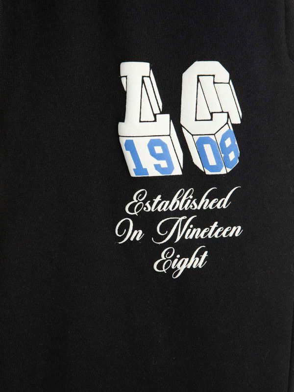 מכנסי טרנינג עם הדפס בנים