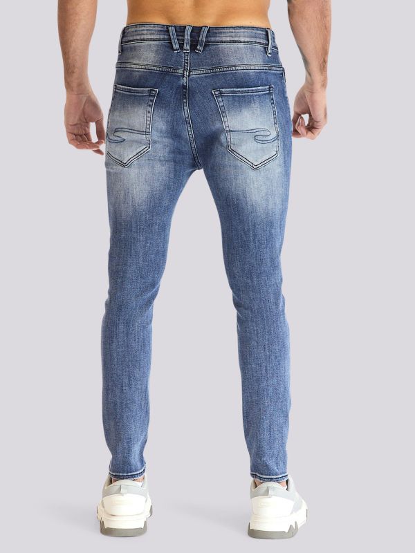 מכנסי ג?ינס COLIN בגזרה מודרנית ונינוחה לגברים