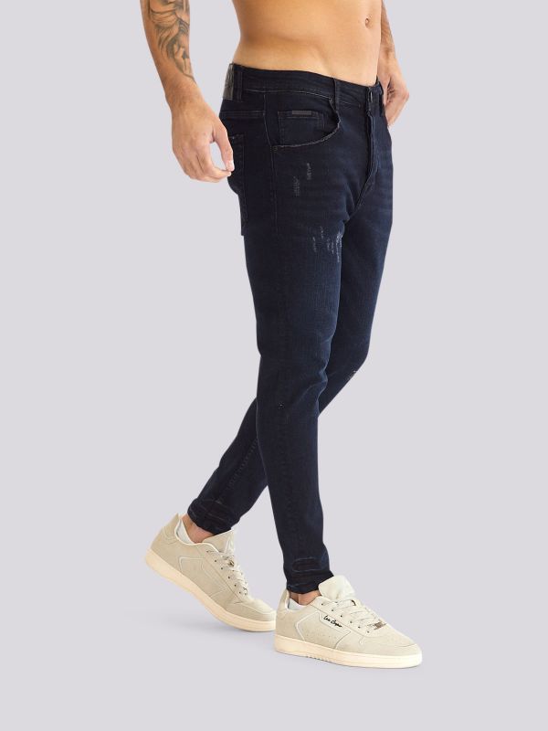 מכנסי ג?ינס COLIN בגזרה משוחררת ומחמיאה לגברים