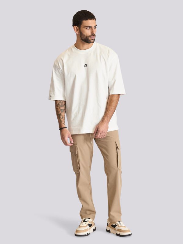 חולצת טי-שרט אוברסייז עם הדפס גרפי וכתפיים שמוטות לגברים