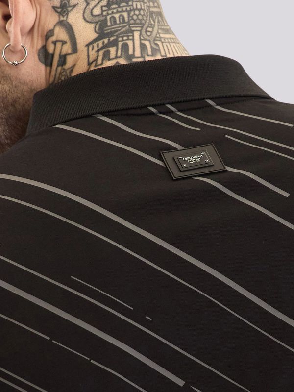 חולצת פולו עם הדפס