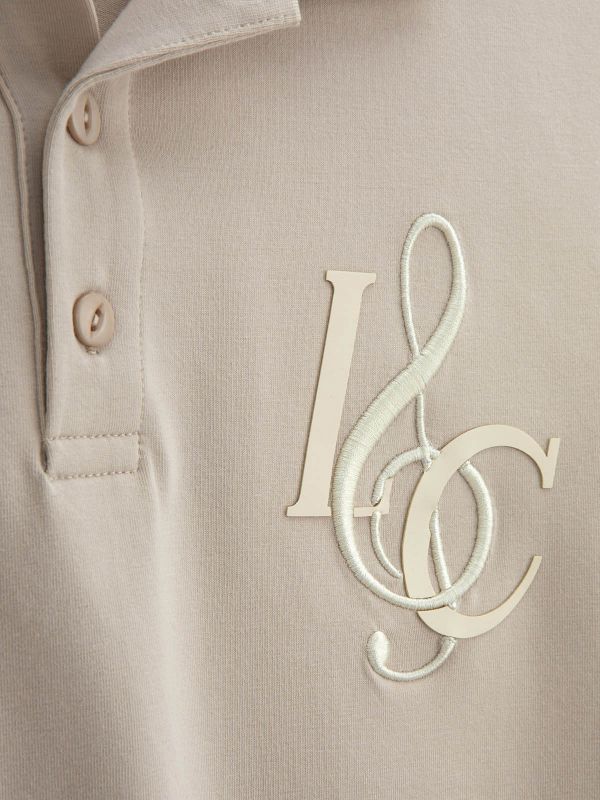 חולצת פולו עם הדפס לילדים