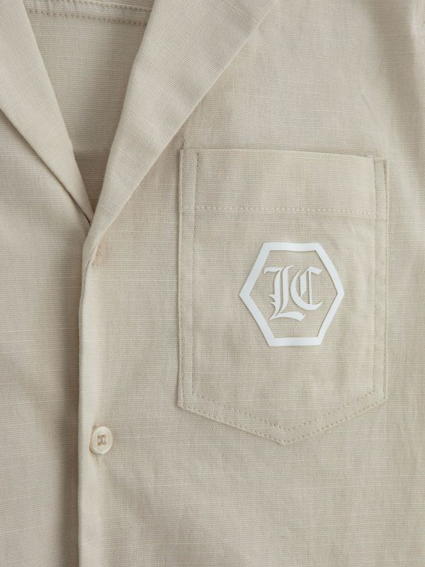 חולצה מכופתרת עם כיס לילדים