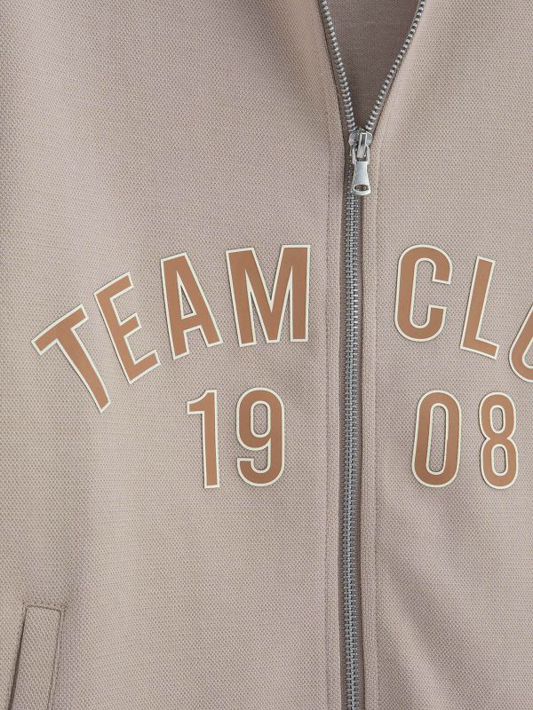 חולצת כדוסל לבנים