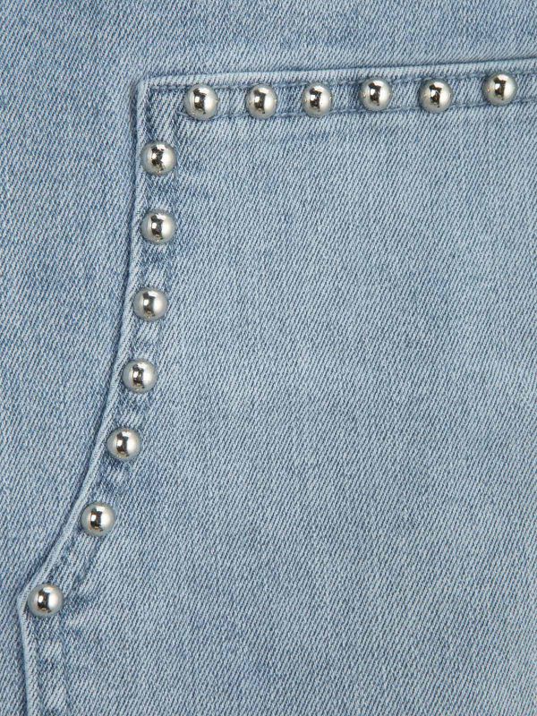 מכנסי ג’ינס עם תיפורים וניטים